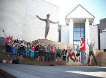 Students jumping in the air at M. Žilinskas Art Gallery.