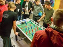 Students playing table football.