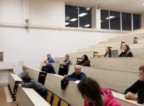 Students sit in the auditorium and listen to lectures